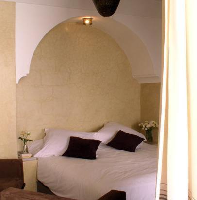 Llit o llits en una habitació de Riad Dar Selen