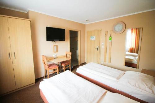 Postel nebo postele na pokoji v ubytování Jagerhof
