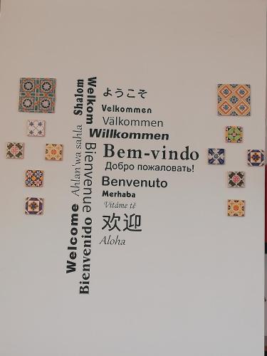 a picture of a sign with different types of tiles at Hotel La Fontaine in Esmoriz
