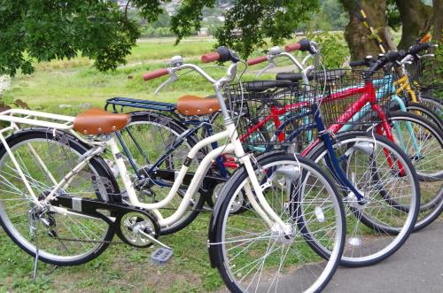 a group of bikes parked next to each other at Ryoso Chatani in Kyoto