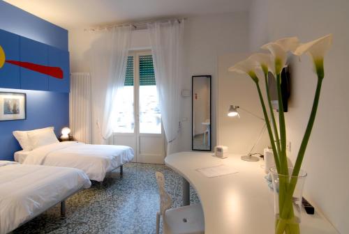 Il Piccolo Roomsにあるベッド