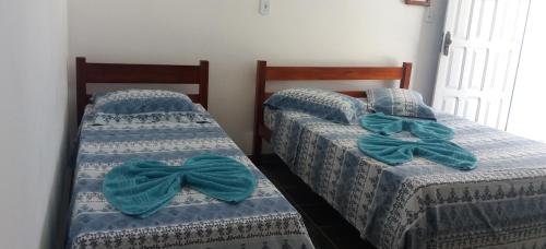 Postel nebo postele na pokoji v ubytování Lagoa Encantada I