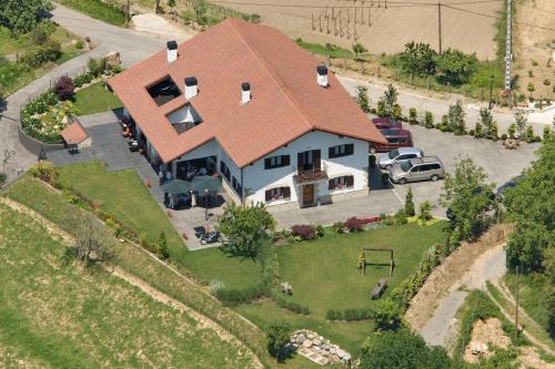 an overhead view of a house with a roof at Hotel Aldori Landetxea - Reserva de la Biosfera Urdaibai - Adults Only in Muxika