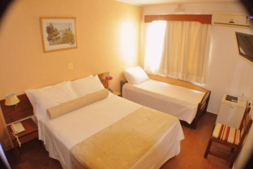 Postel nebo postele na pokoji v ubytování Hotel Torremolinos