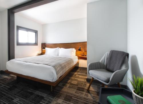 Ein Bett oder Betten in einem Zimmer der Unterkunft Main and Mountain