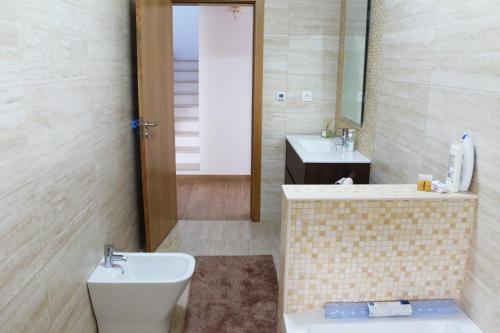 Et badeværelse på Casa da Aldeia Velha - Country House
