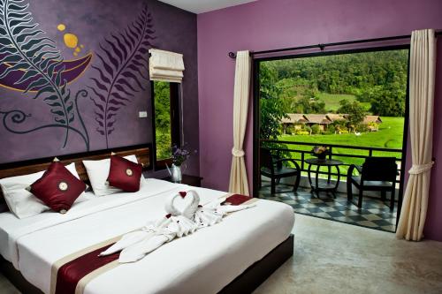 Postel nebo postele na pokoji v ubytování Pai Vieng Fah Resort