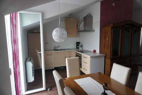 Kuchyňa alebo kuchynka v ubytovaní Apartment Kozina