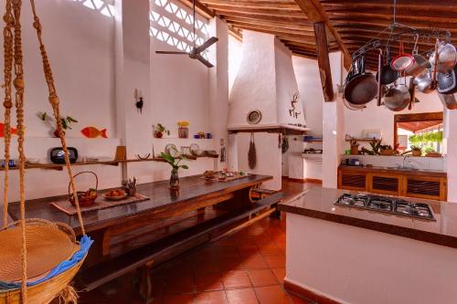 a kitchen with a wooden counter top in a room at Legado de la Marquesa in Mompos