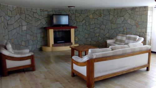 Area tempat duduk di Villas del Sol Hotel & Bungalows