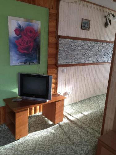 Μια τηλεόραση ή/και κέντρο ψυχαγωγίας στο Guest House U Myrona