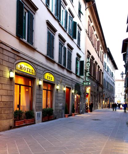 a street with a hotel on the side of a building at Hotel Rex in Florence