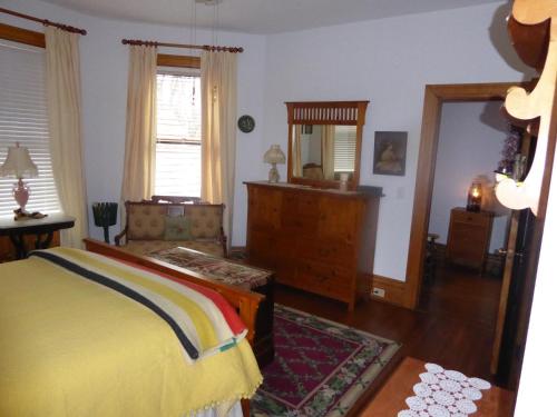 Ένα ή περισσότερα κρεβάτια σε δωμάτιο στο Casa Magnolia B & B