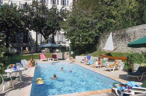 The swimming pool at or close to Aix Appartements