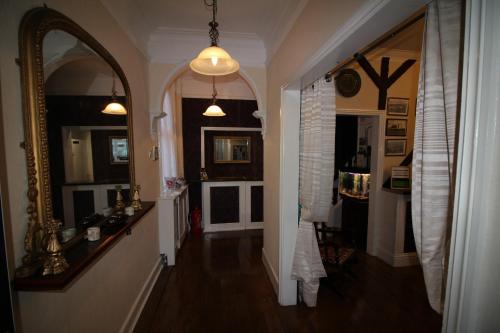 A kitchen or kitchenette at The West Bank Guest House 