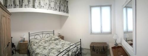 Кровать или кровати в номере Casa del Geco