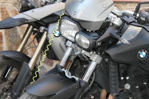 a close up of a motorcycle parked on the street at Casa Rural Luna in Candeleda