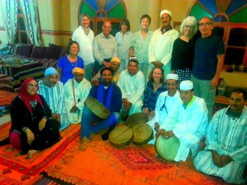 a group of people posing for a picture in a room at Kasbah Tiriguioute in Skoura