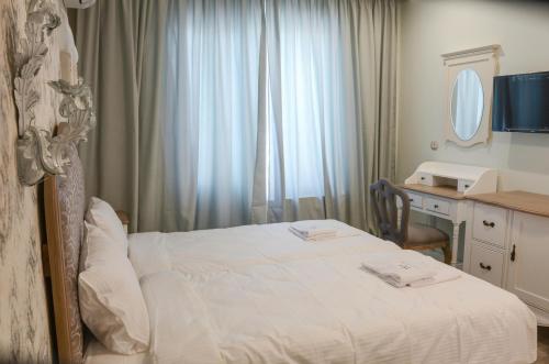 Ένα ή περισσότερα κρεβάτια σε δωμάτιο στο Residence Bilyana