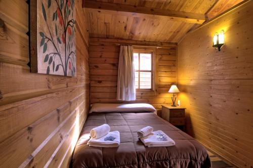 Posteľ alebo postele v izbe v ubytovaní Camping Reina Isabel