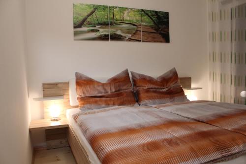 Postel nebo postele na pokoji v ubytování Familienapartment Sunnseitn