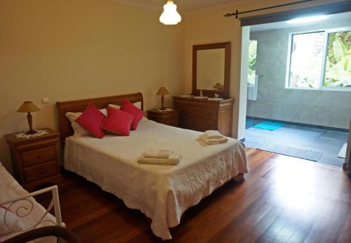 מיטה או מיטות בחדר ב-Villa Catanho