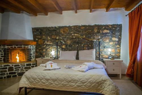 Posteľ alebo postele v izbe v ubytovaní Guesthouse Tsegani
