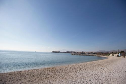 a view of a beach with the ocean at Luxury Apartments Mia in Podstrana