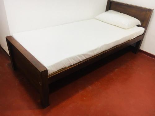 Postel nebo postele na pokoji v ubytování Milkyway Bungalow