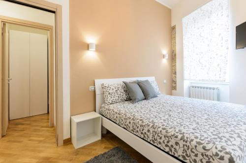 Tempat tidur dalam kamar di Sweet Taormina Apartment