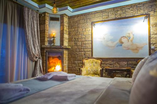 Een bed of bedden in een kamer bij Morfeas Guesthouse