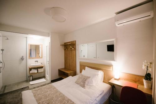 מיטה או מיטות בחדר ב-2I rooms