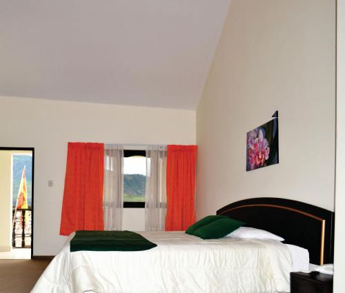 Säng eller sängar i ett rum på Hotel Meflo Chachapoyas