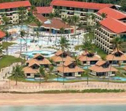 an aerial view of a resort with a pool at Marulhos suítes e resorts in Porto De Galinhas