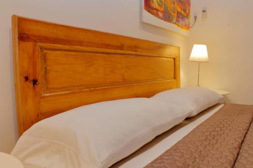 Cama o camas de una habitación en BR& Corazón de la Habana