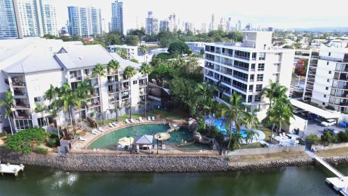 an aerial view of a resort with a pool and buildings at Paradise Island Resort in Gold Coast