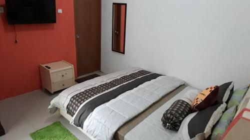Кровать или кровати в номере Villa Penny II