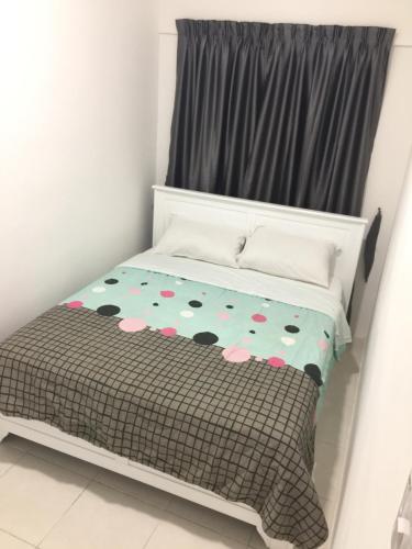Ένα ή περισσότερα κρεβάτια σε δωμάτιο στο Cameron Prima Apartment @ Cameron Jaya