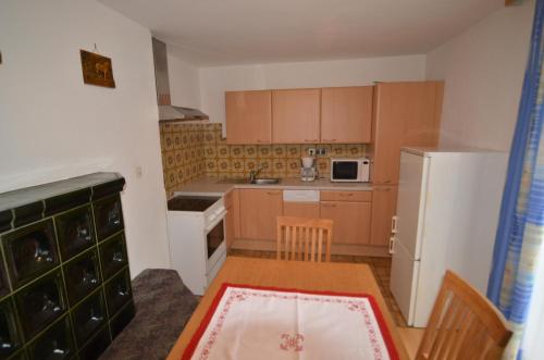 Kuchyň nebo kuchyňský kout v ubytování Almhaus Margit