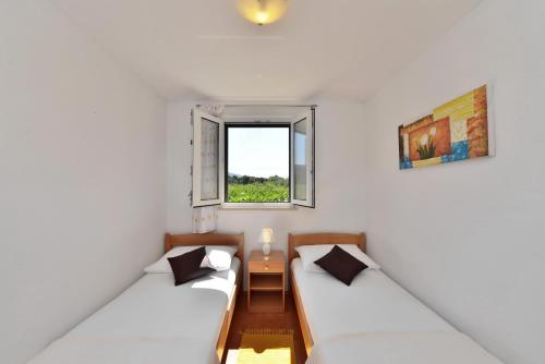 Postel nebo postele na pokoji v ubytování Villa DIVA Holiday House
