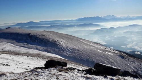 a view from the top of a snow covered mountain at Berg-Arche in Sankt Margarethen im Lavanttal