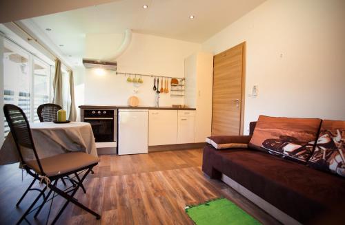 Kuchyň nebo kuchyňský kout v ubytování Apartments Soča