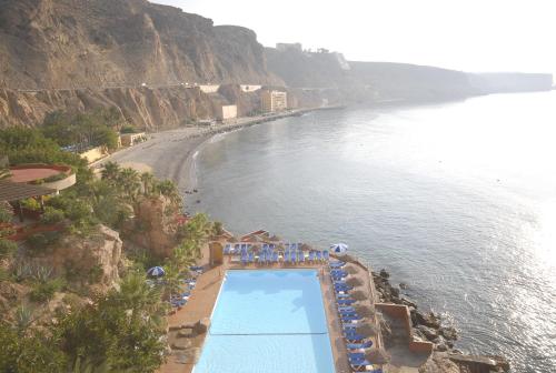 
A view of the pool at Diverhotel Odyssey Aguadulce or nearby
