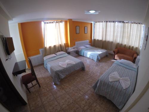 Vuode tai vuoteita majoituspaikassa Hotel Villa del Mar