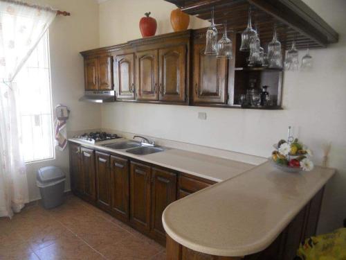 Kuchyň nebo kuchyňský kout v ubytování Apartamento Frente Al Mar