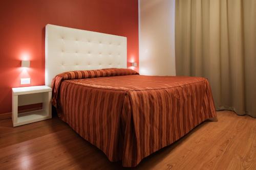 Katil atau katil-katil dalam bilik di Hotel Villa Molinari