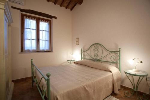 Postel nebo postele na pokoji v ubytování Valle del Metauro Country House