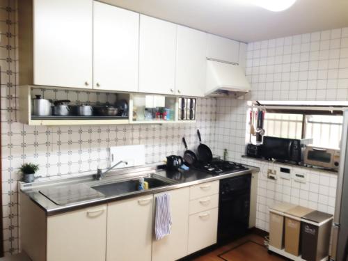 Virtuvė arba virtuvėlė apgyvendinimo įstaigoje EN Guest house
