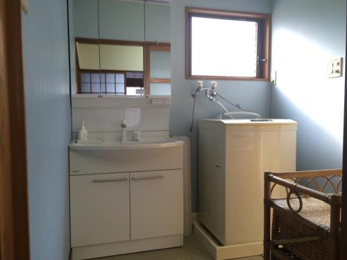 Vonios kambarys apgyvendinimo įstaigoje EN Guest house