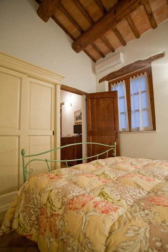 Postel nebo postele na pokoji v ubytování Valle del Metauro Country House